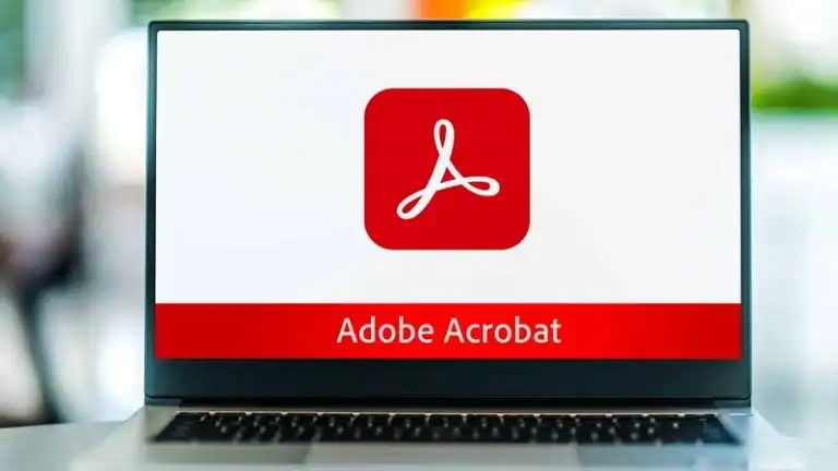 لوگوی Adobe Acrobat روی صفحه لپتاپ